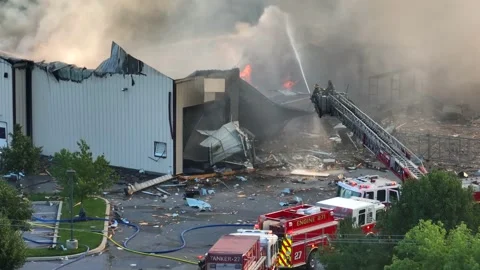 Firefighters responding to building fire due to propane gas leak Video stock 245820615