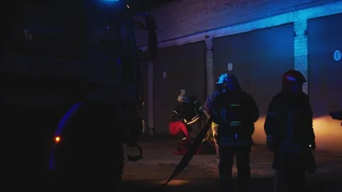 Firefighters Responding to Night Emergency in Building Stock Footage 288084336