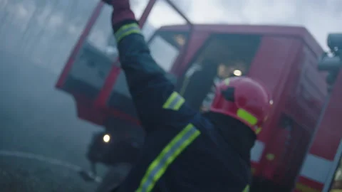 Firefighters rushing to the fire Stock Footage 283139801