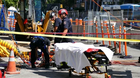 Firefighters saving worker Stock Footage 115971025