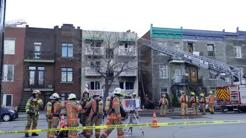 Firefighters on-scene of apartment fire Stock Footage 139664276