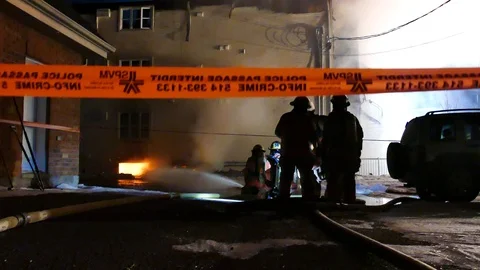 Firefighters scene at night with flames Stock Footage 125454429