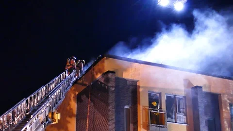 Firefighters on-scene of structure fire Stock Footage 116018086
