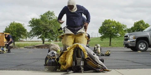 Firefighters Suiting Up Stock Footage 123420170