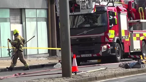 Firefighters tackle major fire on Edinburgh's Princes Street Video stock 339070607