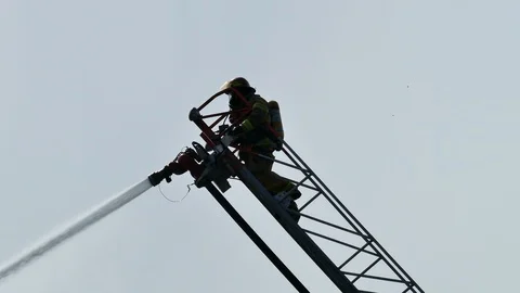 Firefighters on top of ladder Stock Footage 114768400