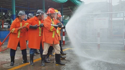 Firefighters training Disaster training exercise depicting gas station. Stock Footage 94398188