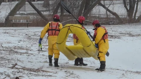 Firefighters Training in Ice Suit on Beach in Winter Stock Footage 60266216