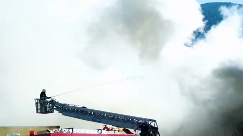 Firefighters Trying to Extinguish a Building Fire 動画素材 201533868