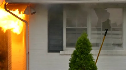 Firefighters Use Halligan Tool To Break And Shatter Windows Video stock 65746356