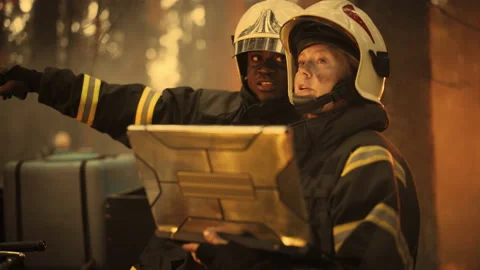 Firefighters Using Laptop Computer in Wildland Fire Stock Footage 224554187