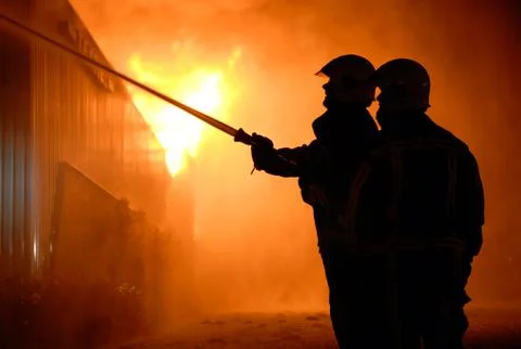 Firefighters at work Foto stock