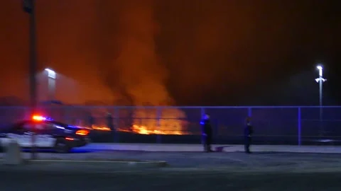 Firefighters working at active brush fire Stock Footage 139658753