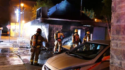 FIrefighters working on burned stuff Video stock 116013937