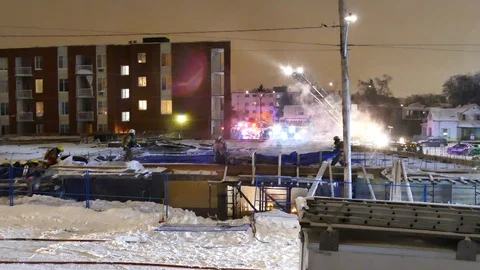 Firefighters working on criminal fire Stock Footage 104026371