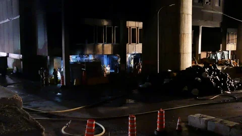 Firefighters working at factory Video stock 114757666
