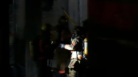 Firefighters working hard Stock Footage 114754452