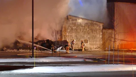 Firefighters working on heavy fire Stock Footage 103630054