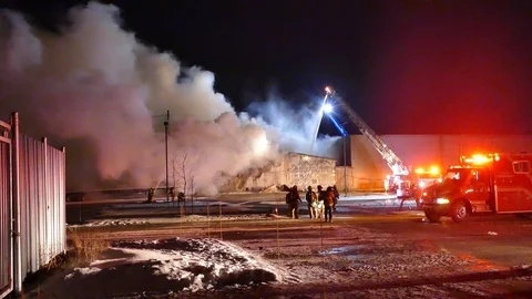Firefighters working on huge fire Stock Footage 103632405