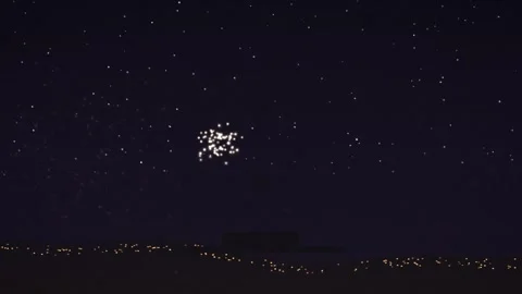 Fireflies Flying in Night Sky with Distant City Lights Background Stock Footage 347655284