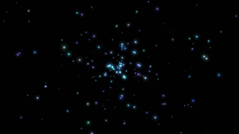 Fireflies. Rainbow flashes pulsate continuously against a black background. Video stock 232940781