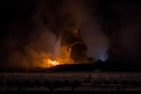 Fireman in action Stock Photos