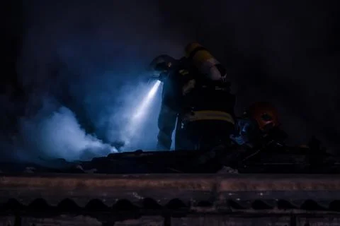 Fireman in action Stock Photos
