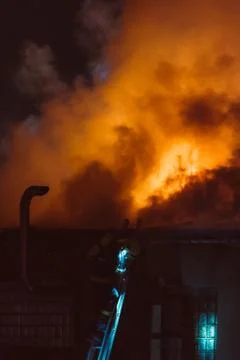 Fireman in action Stock Photos