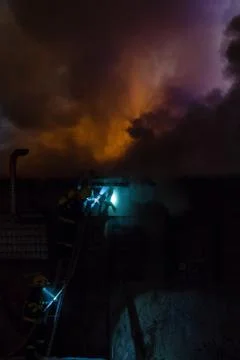 Fireman in action Stock Photos