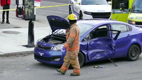 Fireman analyzing crashed car Stock Footage 139654762