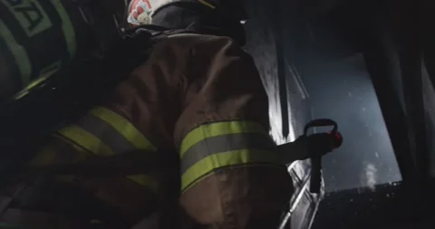 Fireman battles blaze Stock Footage 220576070