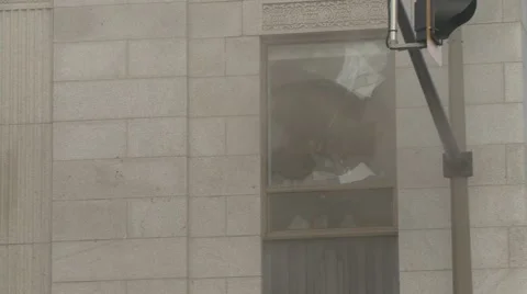 Fireman breaking a windows in a deep smoke Stock Footage 53371512