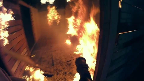 A fireman in a burning house Video stock 75023644