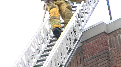 Fireman come down ladder Stock Footage 1059935