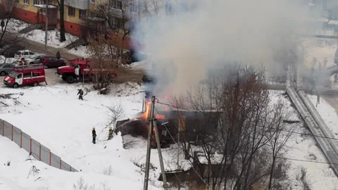 Fireman extinguish fire with the hose. Firefighter spraying water Stock Footage 259478122