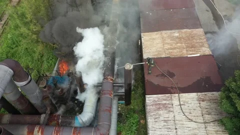Fireman extinguishes the fire on heating main. Stock Footage 206617358