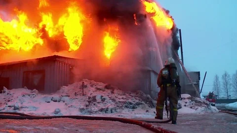 The fireman extinguishes an open fire. Fire. Extinguishing the fire. Lifeguard Stock Footage 72913114