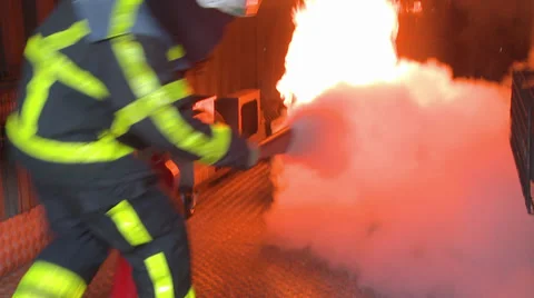 FIREMAN FIGHTING EXTINGUISHER 1 Stock Footage 39379954