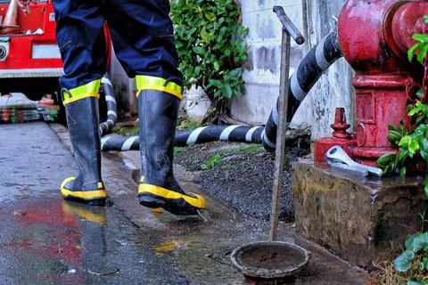 Fireman with Fire Hydrant Stock Photos