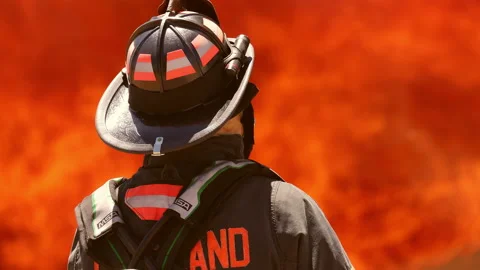 Fireman with Flames Background 動画素材 197446814