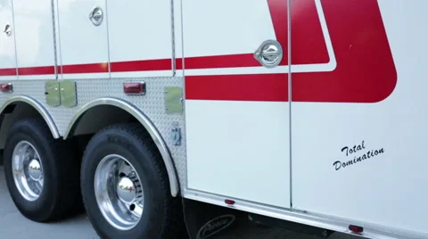 Fireman getting out the jaws of life from the fire engine Stock Footage 66548704