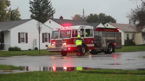 Fireman at an intersection Stock Footage 32298357