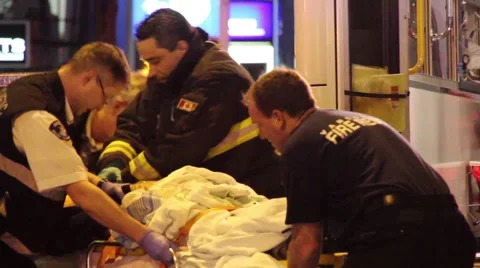 Fireman performing CPR first aid on victim Stock Footage 39978248