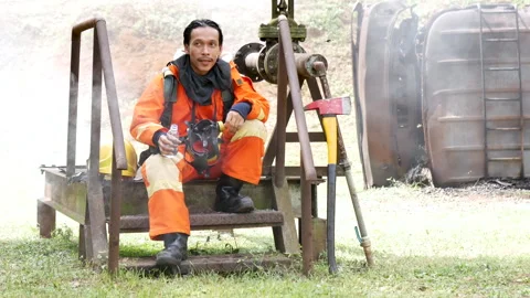 Fireman prepare equipment at fire engine truck Vídeo Stock 276346845