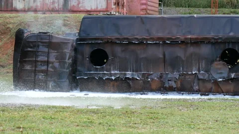 Fireman prepare equipment at fire engine truck using spray foam. safety Rescue t Vídeo Stock 337748786