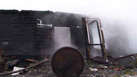 Fireman puts out burning house.. Belarus/Oshmyany/18 December 2018 Stock Footage 100530636