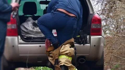 Fireman puts on uniform. Stock Footage 109388694