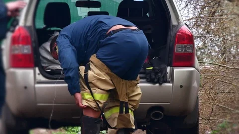 Fireman puts on uniform. Stock Footage 109388722