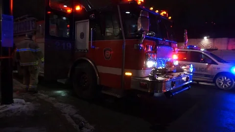 Fireman putting some stuff in the truck Stock Footage 87752287