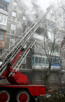 Fireman on the stairs Stock Photos